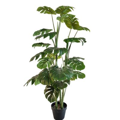 China Artificial Monstera Tree Plants Materials Modern Indoor Home Decor 4Ft Large Large Fake Plastic Leaves Eco-Friendly In Pot for sale