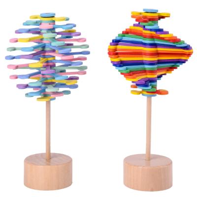 China Kids Fun Toys Order Spinning Lollipop Toy Rainbow Color Tree Fun Magic Wooden Spinning Spiral Spinning Toy For Children for sale