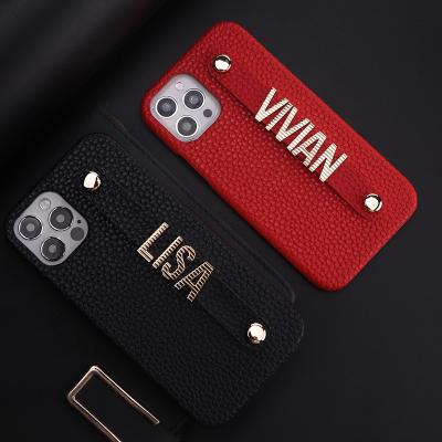 China Luxury Shockproof Personalize Name Pebble Cowhide Leather Phone Case For iPhone 14 ProMax Crossed Out Letter Funda Metal Coque for sale