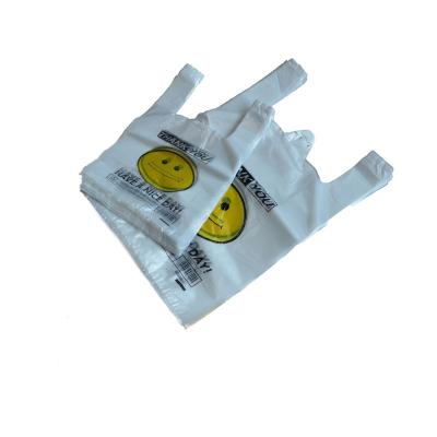 China Supermarket Recyclable Reusable Smiling Grocery Bag Plastic HDPE T-shirt Bag for sale