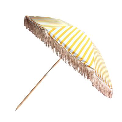 China Modern Wholesale Waterproof Modern Tassels Outdoor Decorative Cool Wooden Patio Pole Commercial Beach Umbrella With Fringe Trim for sale