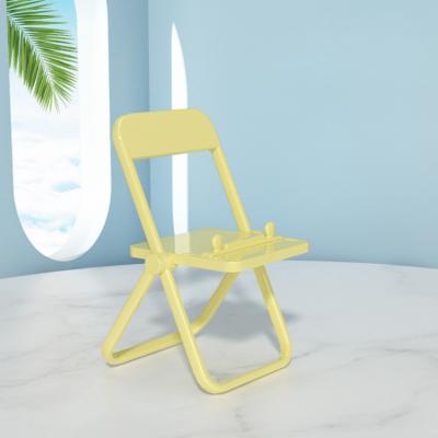 China Lower Price PORTABLE Chair Shape Cell Phone Stand Folding Cell Phone Desk Stands Stand Lazy Cell Phone Stand Holder for sale