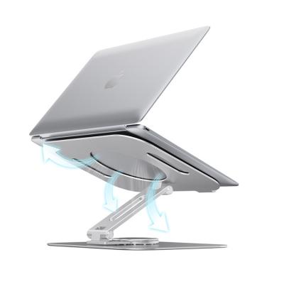 China Slim Folding Fit Laptop Notebook Metal Folding Rotatable Holder Portable Foldable Notebook Desk Stand Holder for sale