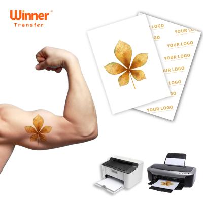 China 2021 New Gold Laser Inkjet Tattoo Paper Laser Temporary Tattoo A4 A3 Transfer Winner Winner Temporary Tattoo Paper Paper for sale