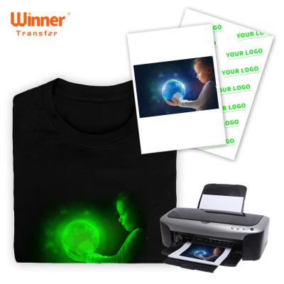 China Custom T-shirts OEM Logo Glow in the Dark Heat Transfer Paper for Light&Dark Luminous Fluorescent Fabric A4 Transfer Printing Paper for sale