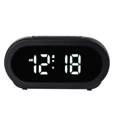 China Hot Sale Antique Premium Desktop Oval Shine Style Adjustable USB Charging LED Alarm Clock With Light Function for sale