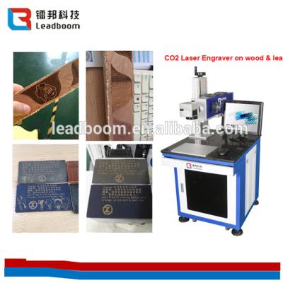 China Laser Tube Co2 Laser Marking Machine 10W/30w For Leather  / Organic Glass/ paper for sale