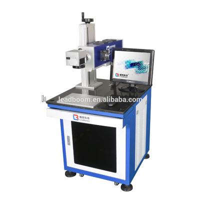 Cina 50KHz 10W Plastic CO2 Laser Marker Machine Online Flying Printing Cloth in vendita