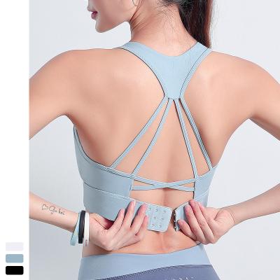 China Breathable Women Relieve Padded Racerback Fitness Gym Training Yoga Sports Bra Wholesale for sale