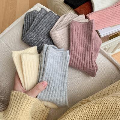 China Factory wholesale sporty winter warm cashmere new and thick woolen thongs wild solid color women crew socks for sale