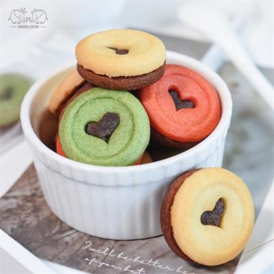 China Mini Galletas Heart Shape Melon Strawberry Fruit Milk Choco Cookies Snack Chocolate Cream Sandwich Biscuits à venda