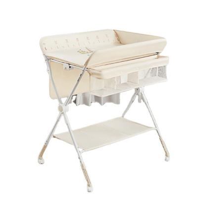 China Universal Luxury Newborn Baby Changing Table Adjustable Size Diaper Station Crib Storage Changing Tub for sale