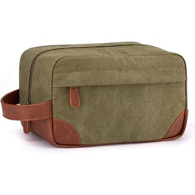 China Designer Customized Logo Luxury Waterproof PU Leather Canvas Toiletry Bag For Men for sale