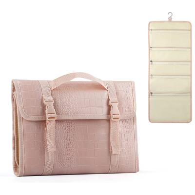 China Fashion Portable Foldable Waterproof PU Leather Luxury Trending Cosmetic Bag For Women for sale