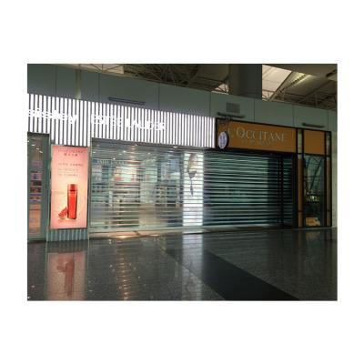 China Anti - Theft Self Rolling Doors Custom Clear Polycarbonate And Frosted PC Roll Up Shutters for sale