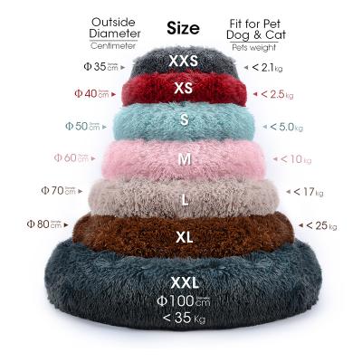 China Ultra Soft Travel Eco Plush Round Donut Pet Nest Heated Fluffy Soothing Dog Sofa Bed Cushion Luxury Washable Cat Dog Bed for sale