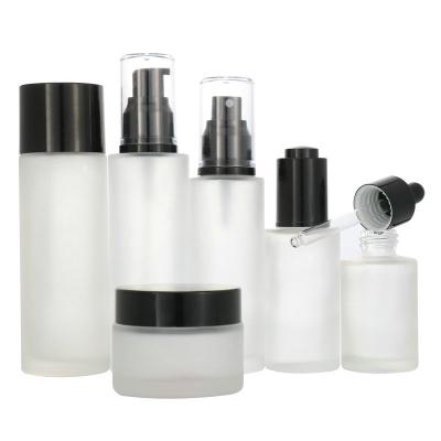 China High Quality Luxury Matte Round 30mL Glass Bottles Skin Care Packaging Foundation Liquid Bottle With Pump for sale