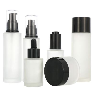 China High Quality Hot Selling Customized Skin Care Cream Lotion Perfume Essential Body Oil Glass Bottles Set With Pump And Dropper for sale