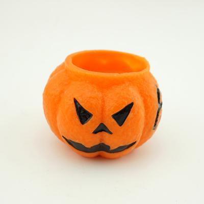 China Hot Sale Birthdays Hand Carved Custom Pumpkin With Evil Eye Shaped Handmade Candles for sale