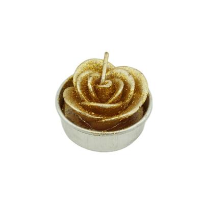 China Smokeless Twinkle Christmas Cut Out Paraffin Wax Artificial Rose Tea Light Flameless Craft Candles for sale