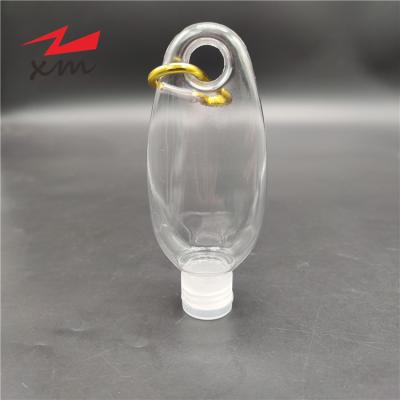 China HOT Soap Product Key Ring PETG Keychain Hand Sanitizer Bottle 50ml Carabiner Cleaning Bottle With Flip Top Lid for sale