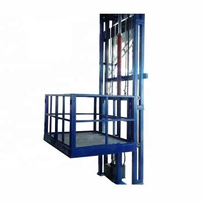 China Building Material Shops Electric Guide Rail Lift Platform 6m 8m 10m 12m Indoor Safety Chain Electric Cargo Lift Door 220v 380v Optional for sale