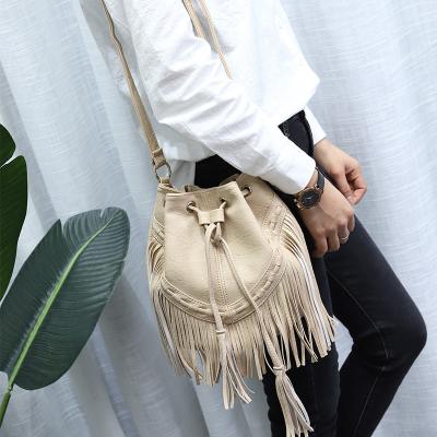 China Wholesale 2021 Free Time New Fashion Women's Statistical Institute Women's Bag Manual Single Shoulder Messenger Bag Tassel Bucket Bag Pull Rope Leisure for sale