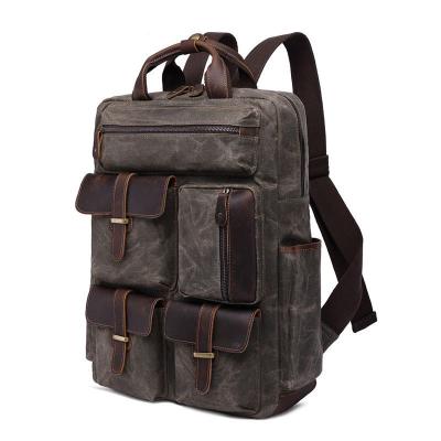 China Waterproof Men's Leather Backpack, Retro Laptop Bag, Multi-pocket Large Canvas Casual Travel Backpack for sale