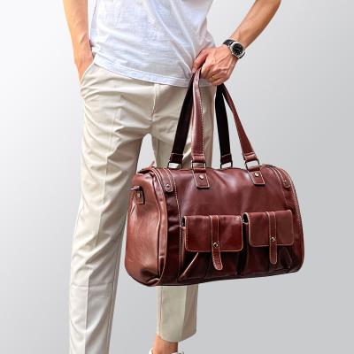 China Custom Logo Waterproof Leather Men's Weekend Duffel Bag Large Capacity Travel Duffle Bag Business Handheld Folding Leather Bag Wear Resistant for sale