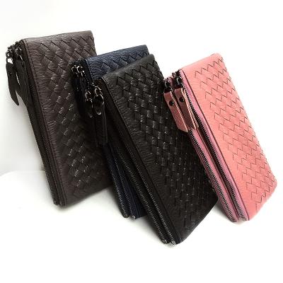 China Hand weaving hand 2021 pure - multi button zero multi button magnetic wallet card wallet card business woven thin woven men and women purse PU collection bag for sale