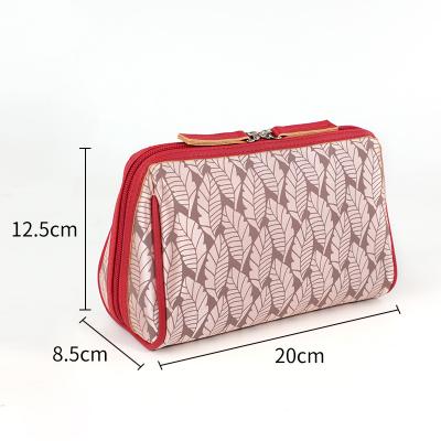 China New Series Leaf Pattern Printing Durable Cute Portable Travel Capacity Polyester Cosmetic Bag for sale