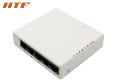 China interruptor de rede do porto de 100mbps 1G 5 com fonte do adaptador da alimentação externa 5V/1A da C.C. à venda