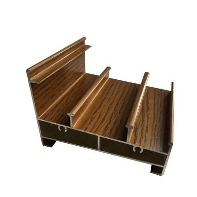 China New Design Transfer Wood Industrial Grain Nepal Market Aluminum Sliding Door Track Profile Price for sale