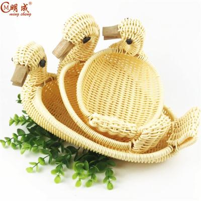 China Creative handmade rattan woven fruit stored cartoon animals woven basket open rattan basket for sale