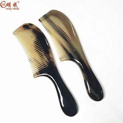 China Men/women/gift to friend or relatives shop handle anti static flower white flower black yaks BEEF horn comb massage hair comb craft gift horn beard hair combs for sale