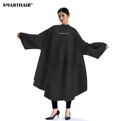 China Customized Hairdresser Water Repellent Black High Quality Barber Cape Salon Polyester Hair Cutting Cape With Sleeves for sale