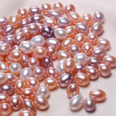 China Eco-Friendly Rice Shaped Pearl Keshi Pearl Loose Cultured Pearl Button Top With Hole Pink White Purple Loose Pearl for sale