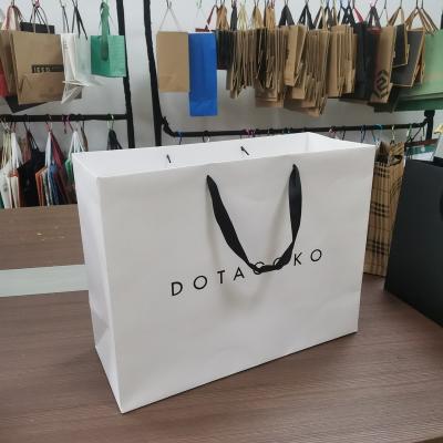 China Recyclable customized shopping bag 100% recycled luxury paper tote eco reusable pouch for supermarket for sale