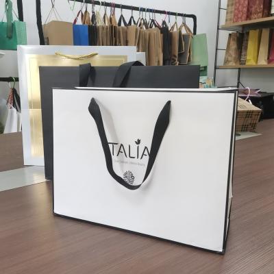 China Recyclable Wholesale Promotional Paper Shop Fine Cardboard Tote Shopping Bags With Ribbon Handle for sale