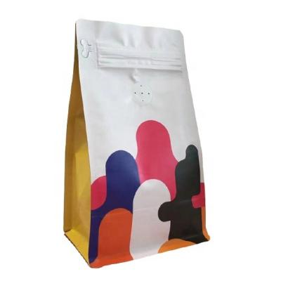 China Custom Mylar Block Print Food Grade Barrier Bottom Pouch With Zipper 250g Coffee Packaging Pouch Bag for sale