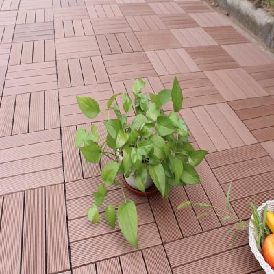 China Modern Cheap Wooden Plastic Compound Path Garden Interlocking Tiles Pathway Decking Tiles for sale