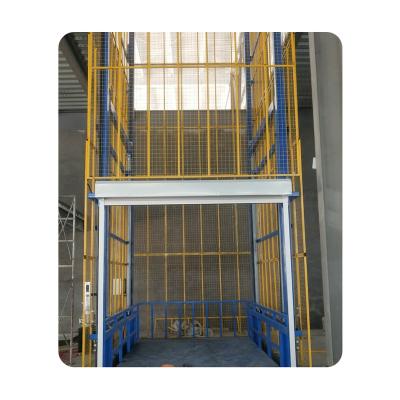 China Hotels Mounted Cargo Elevator 2 Ton Electric Cargo Elevator Small Cargo Elevator Warehouse Lift for sale