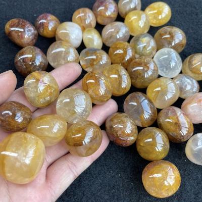 China Europe Wholesale High Quality 20-30mm Spiritual Stones Natural Yellow Fire Quartz Crystal Tumbled Stone for sale