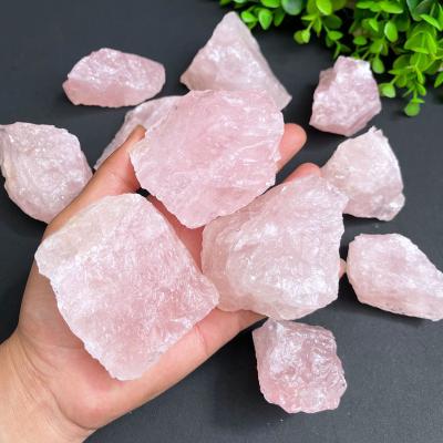 China Europe 5-8cm Wholesale Bulk Healing Stones Natural Rough Pink Quartz Crystal Stone Raw Rose Crystal for sale