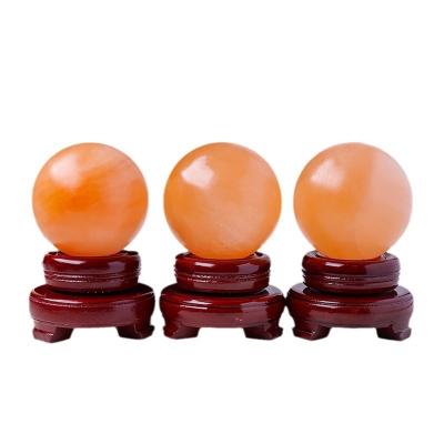 China Europe Wholesale Natural Crystal Healing Orange Gypsum Ball Selenite Sphere For Decoration for sale