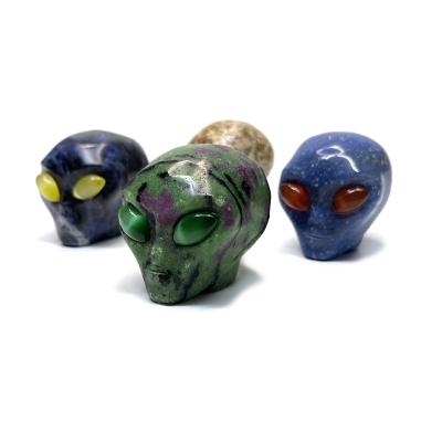 China Europe Wholesale Semi-precious Stone Crafts Hand Carved Natural Ruby In Zoisite Quartz Crystal Alien Skulls For Home Decoration for sale