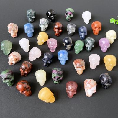 China Europe 2.5cm Rose Quartz Skulls Crystal Healing Stones Crystal Crafts Holiday Gift Human Skulls Statue Meditation Stone for sale