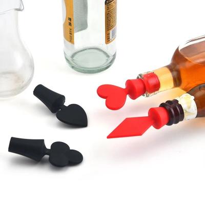 China Creative Safely Sealing Food Grade Poker Shaped Silicone Wine Bottle Stopper Preservation Leakproof Sealing Multifunctional Plug for sale