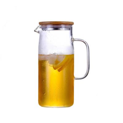 China 850-1500ML high quality creative sustainable hand blown borosilicate home transparent glass teapot with bamboo lid for sale