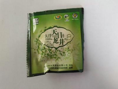 China Bolsita de té orgánica 100% de Longjing de las bolsitas de té de la pirámide del OEM con el logotipo de la impresión en venta